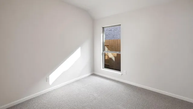 a view of a room with a window