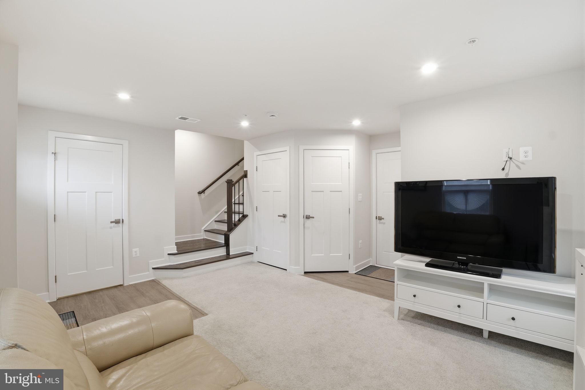 8437 Hamlin Street Lanham, MD 20706 - Photo 29 of 34 Lower level family room