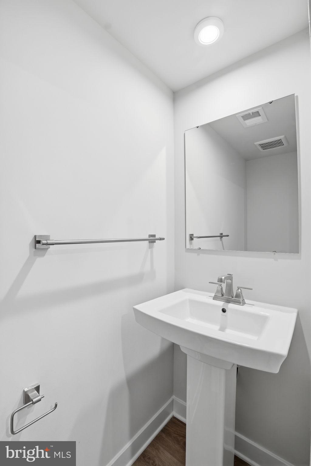 8437 Hamlin Street Lanham, MD 20706 - Photo 30 of 34 Half bath