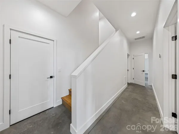 a view of hallway with stairs