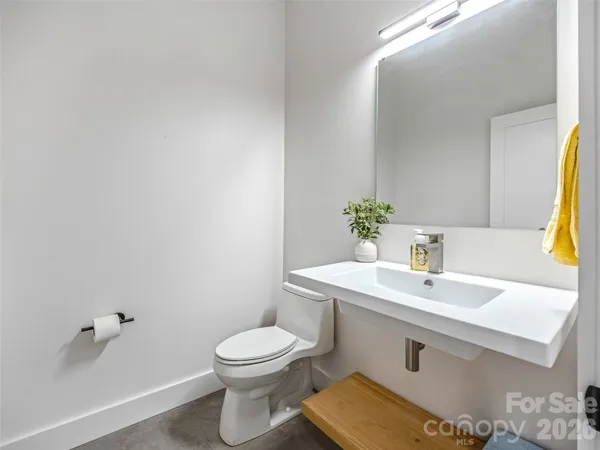 a bathroom with a sink and a toilet