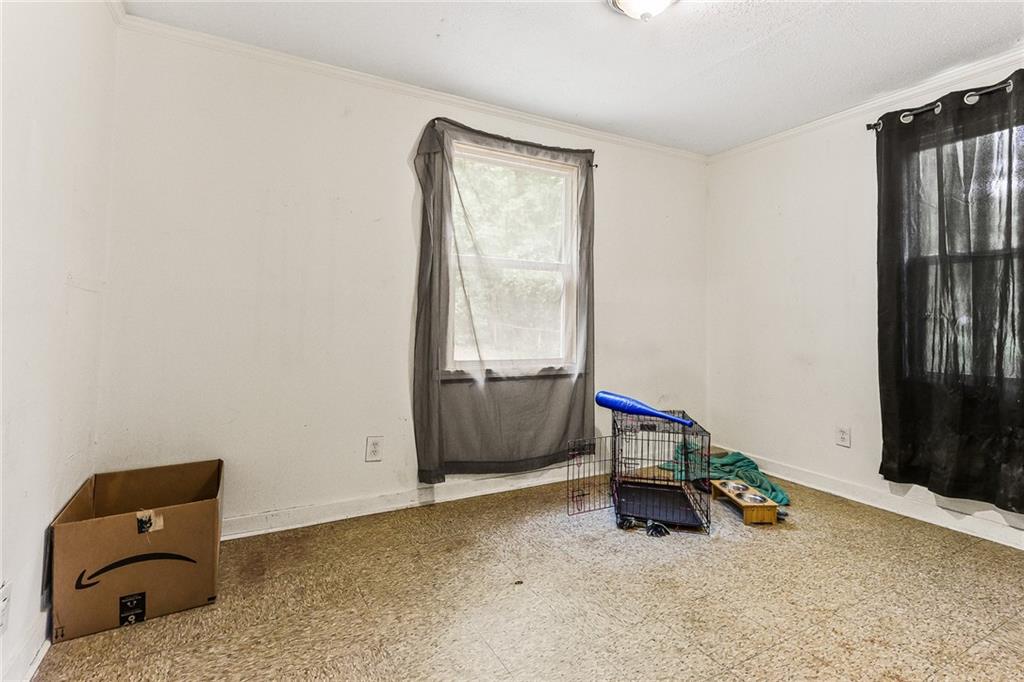 2231 Penelope Street Northwest Atlanta, GA 30314 - Photo 20 of 23 an empty room with windows