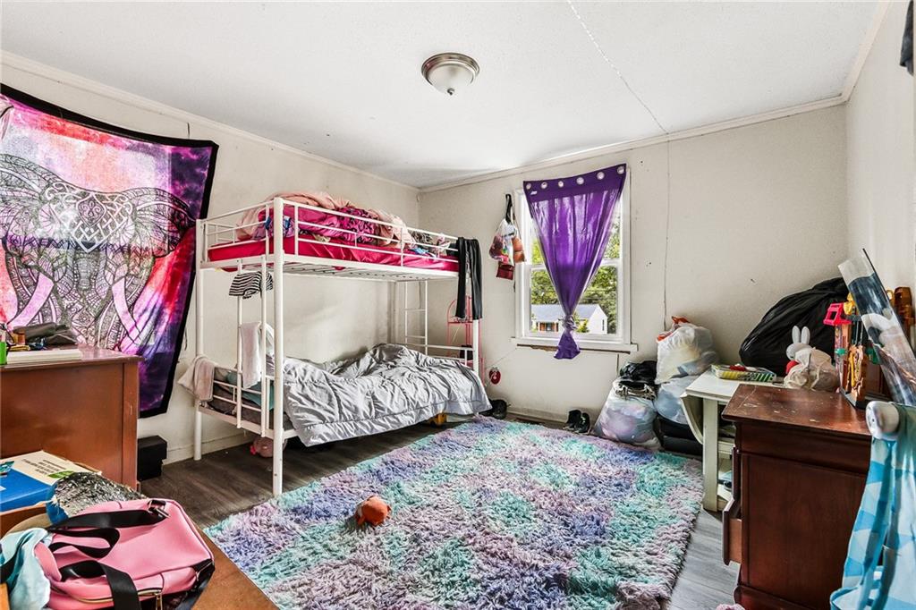 2231 Penelope Street Northwest Atlanta, GA 30314 - Photo 21 of 23 a bedroom with bed and a window