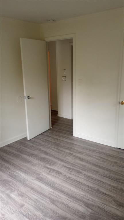 2231 Penelope Street Northwest Atlanta, GA 30314 - Photo 5 of 23 a view of an empty room and wooden floor