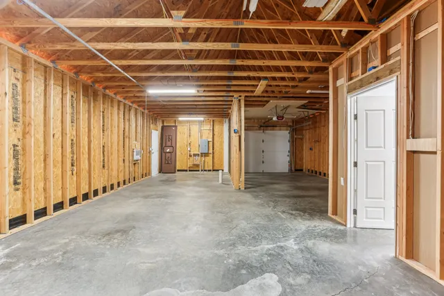 a view of a room with wooden walls