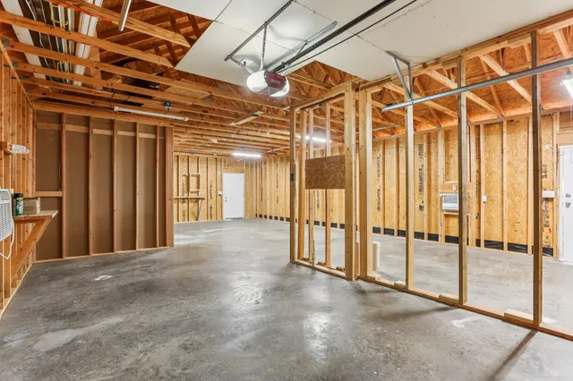a view of a room with wooden walls
