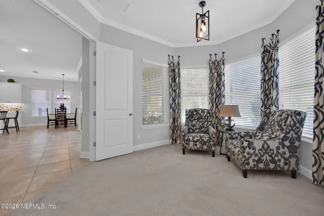 a bathroom with a sink a toilet a mirror a vanity a bathtub and shower