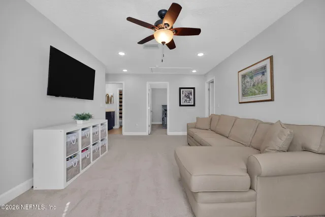 an aerial view of a house with a garden