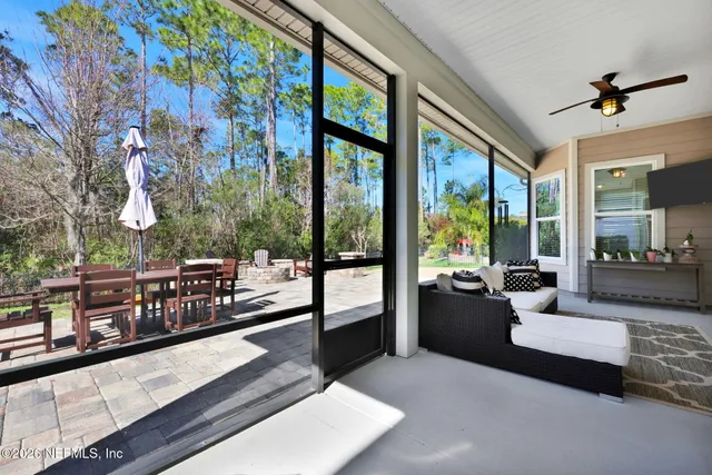 a view of a street with a tree in the background