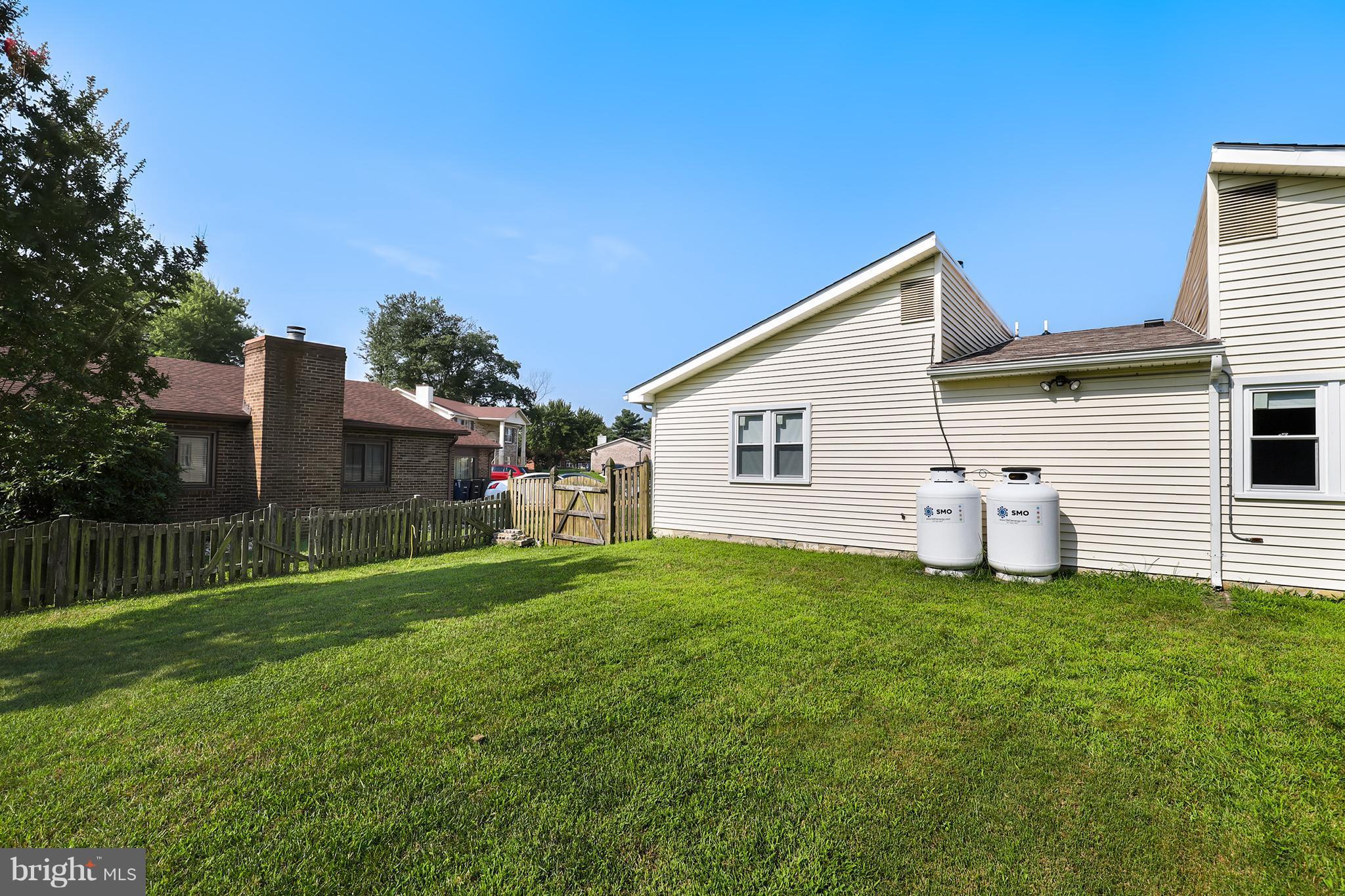 10604 Gator Court Clinton, MD 20735 - Photo 22 of 24 a view of a house with a yard