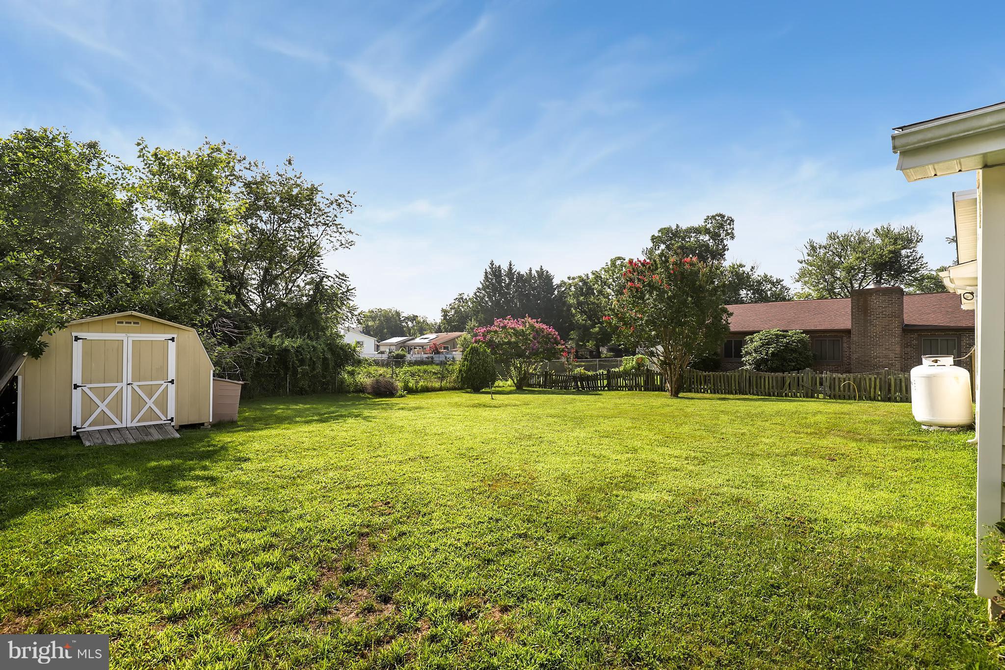 10604 Gator Court Clinton, MD 20735 - Photo 24 of 24 a view of a big yard with a house