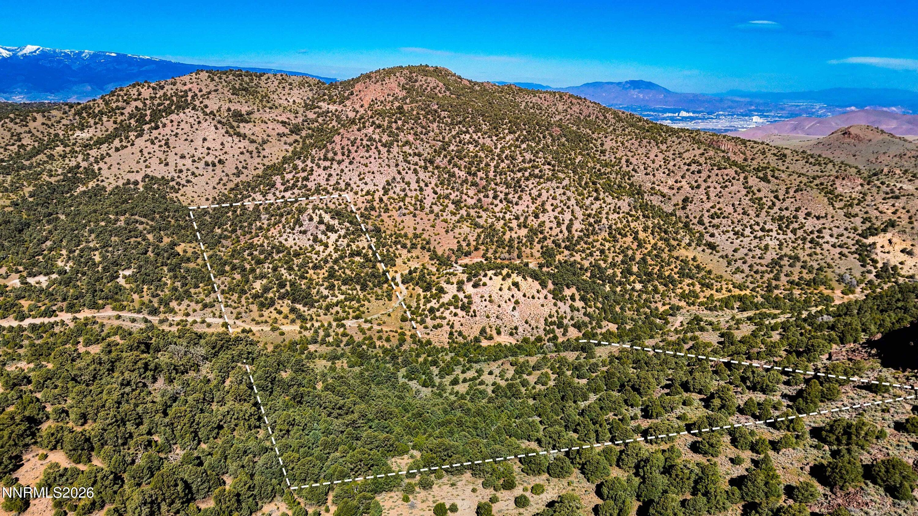2120 Castle Peak Road Reno, NV 89521 - Photo 12 of 54 a view of a large mountain with a mountain in the background