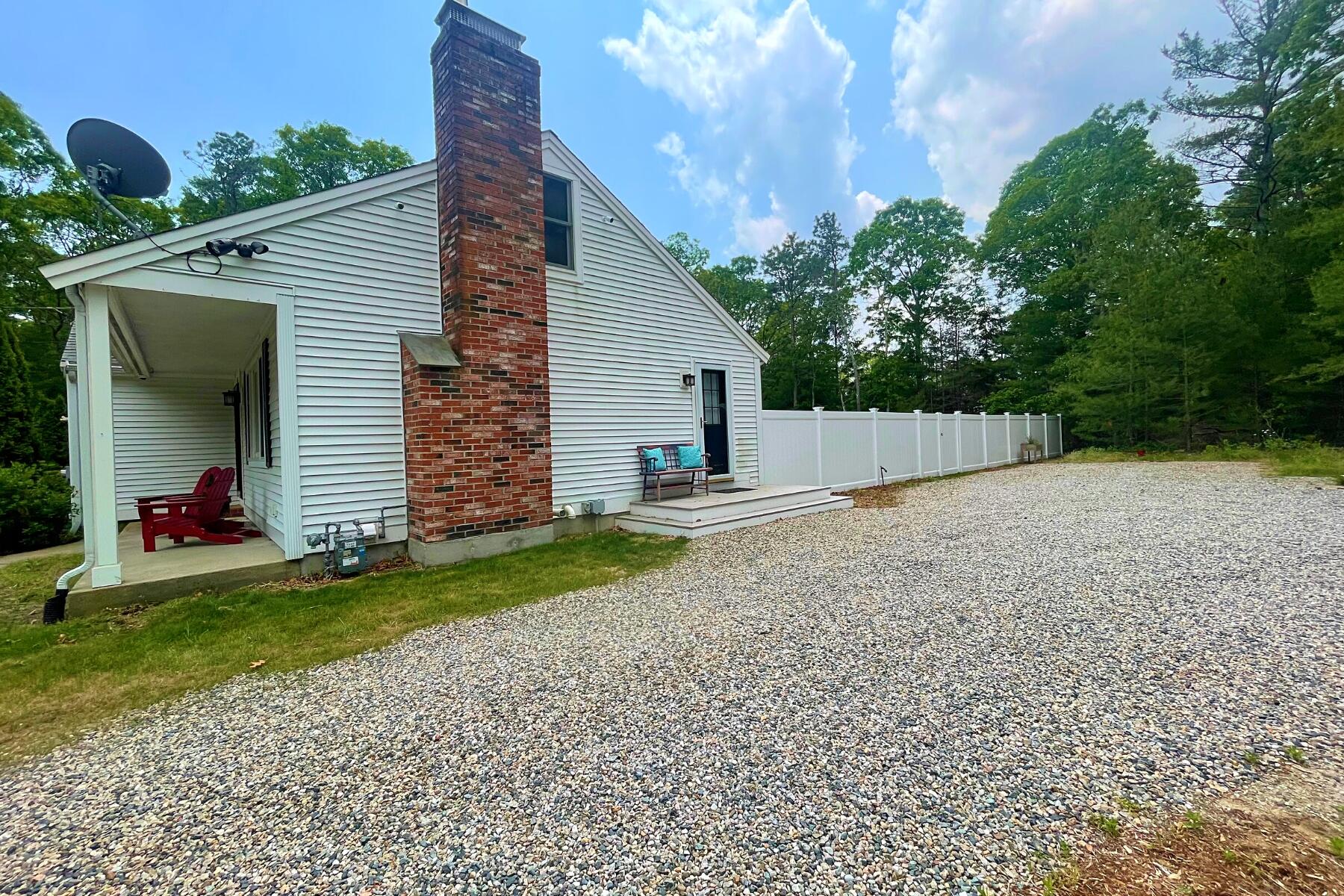 263 Cammett Road Marstons Mills, MA 02648 - Photo 12 of 33 a view of a back yard of the house