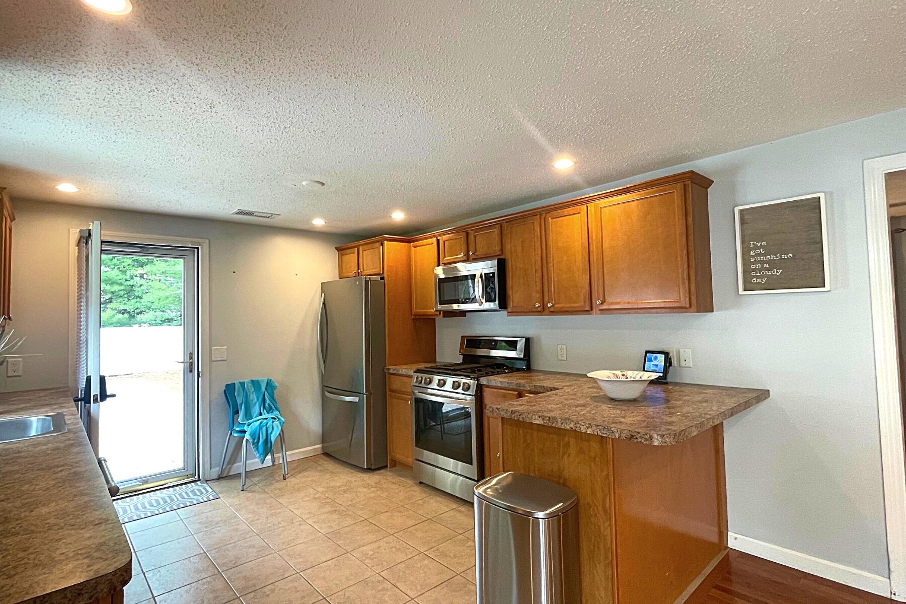 263 Cammett Road Marstons Mills, MA 02648 - Photo 14 of 33 a kitchen that has a sink cabinets counter space and appliances