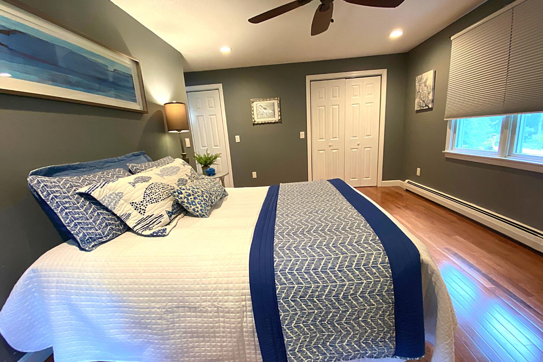 263 Cammett Road Marstons Mills, MA 02648 - Photo 17 of 33 a bedroom with a bed and a window