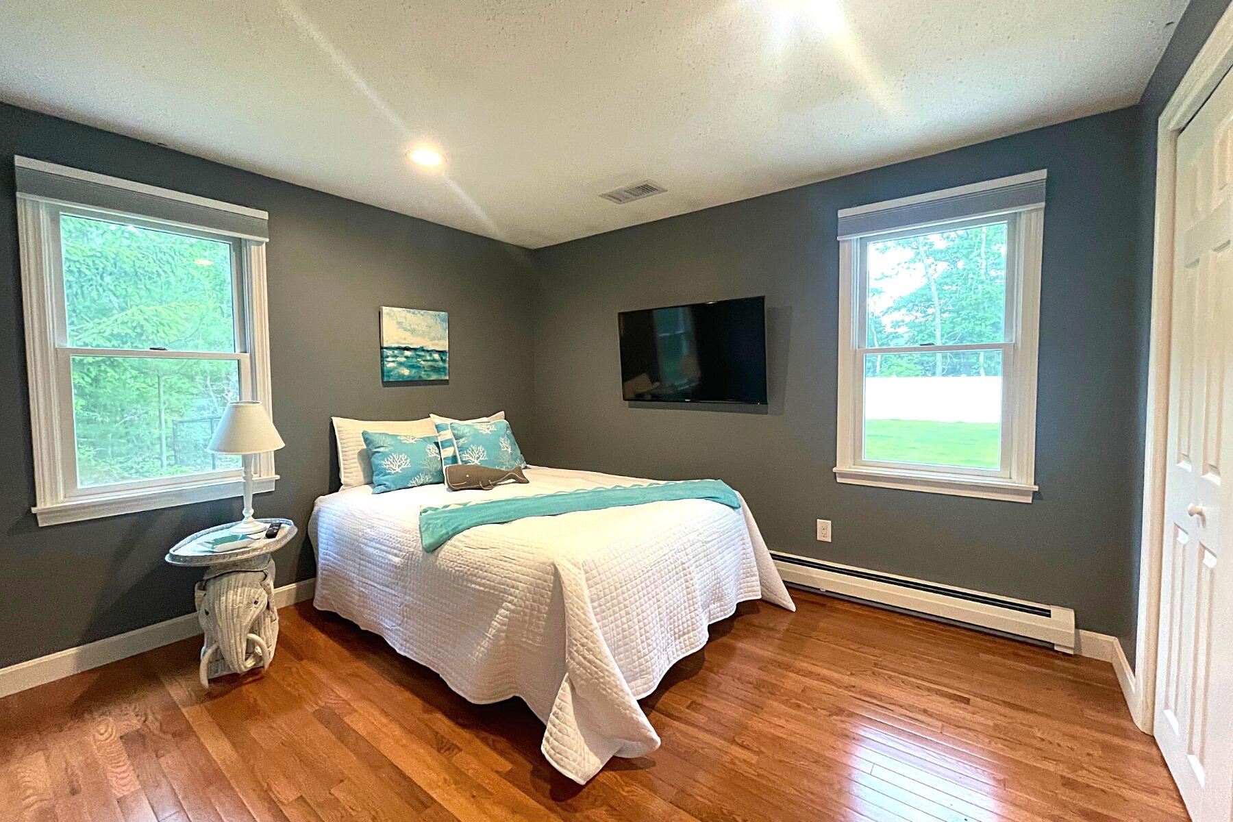 263 Cammett Road Marstons Mills, MA 02648 - Photo 21 of 33 a bedroom with a bed and a window