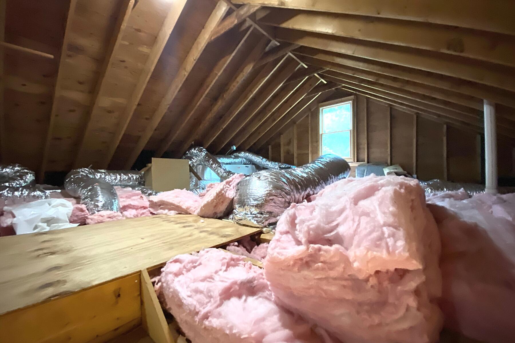 263 Cammett Road Marstons Mills, MA 02648 - Photo 30 of 33 a bed sitting in a bedroom next to a larger window