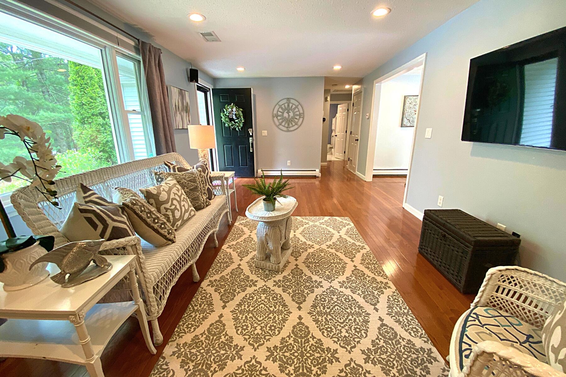 263 Cammett Road Marstons Mills, MA 02648 - Photo 7 of 33 a living room with furniture and a flat screen tv