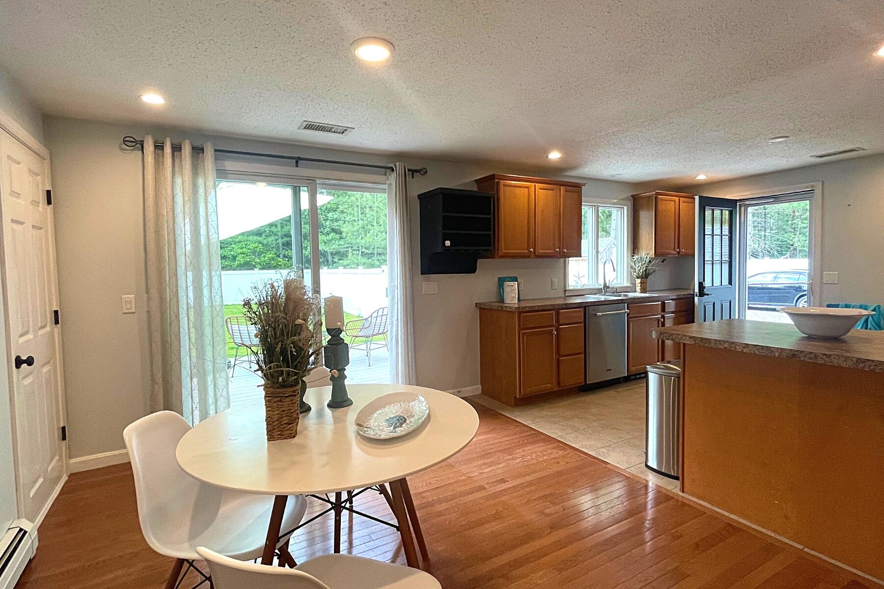 263 Cammett Road Marstons Mills, MA 02648 - Photo 9 of 33 a view of a dining room with furniture window and outside view