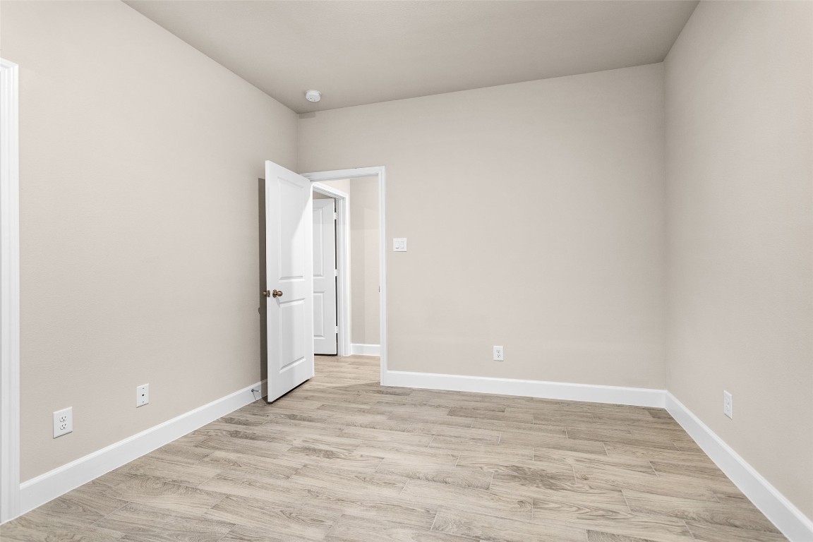 496 Golden Street, Unit A Willis, TX 77378 - Photo 16 of 26 a view of an empty room