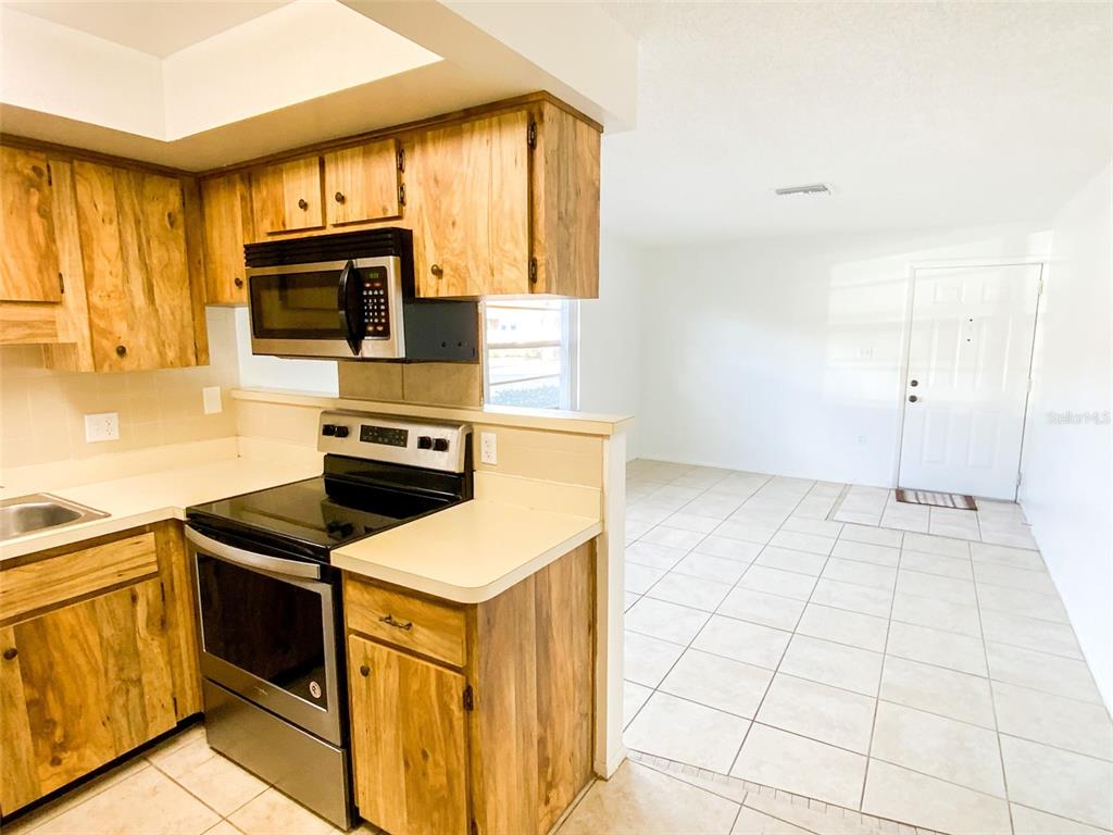 6036 Chesham Drive, Unit 5 New Port Richey, FL 34653 - Photo 4 of 25