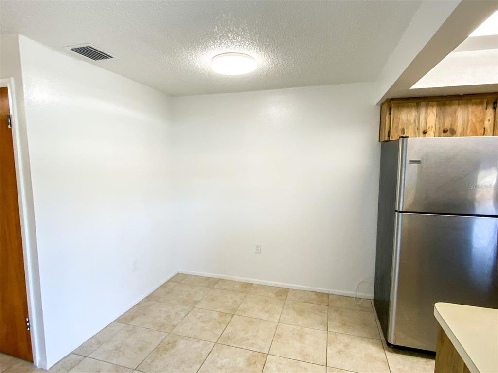 6036 Chesham Drive, Unit 5 New Port Richey, FL 34653 - Photo 5 of 25