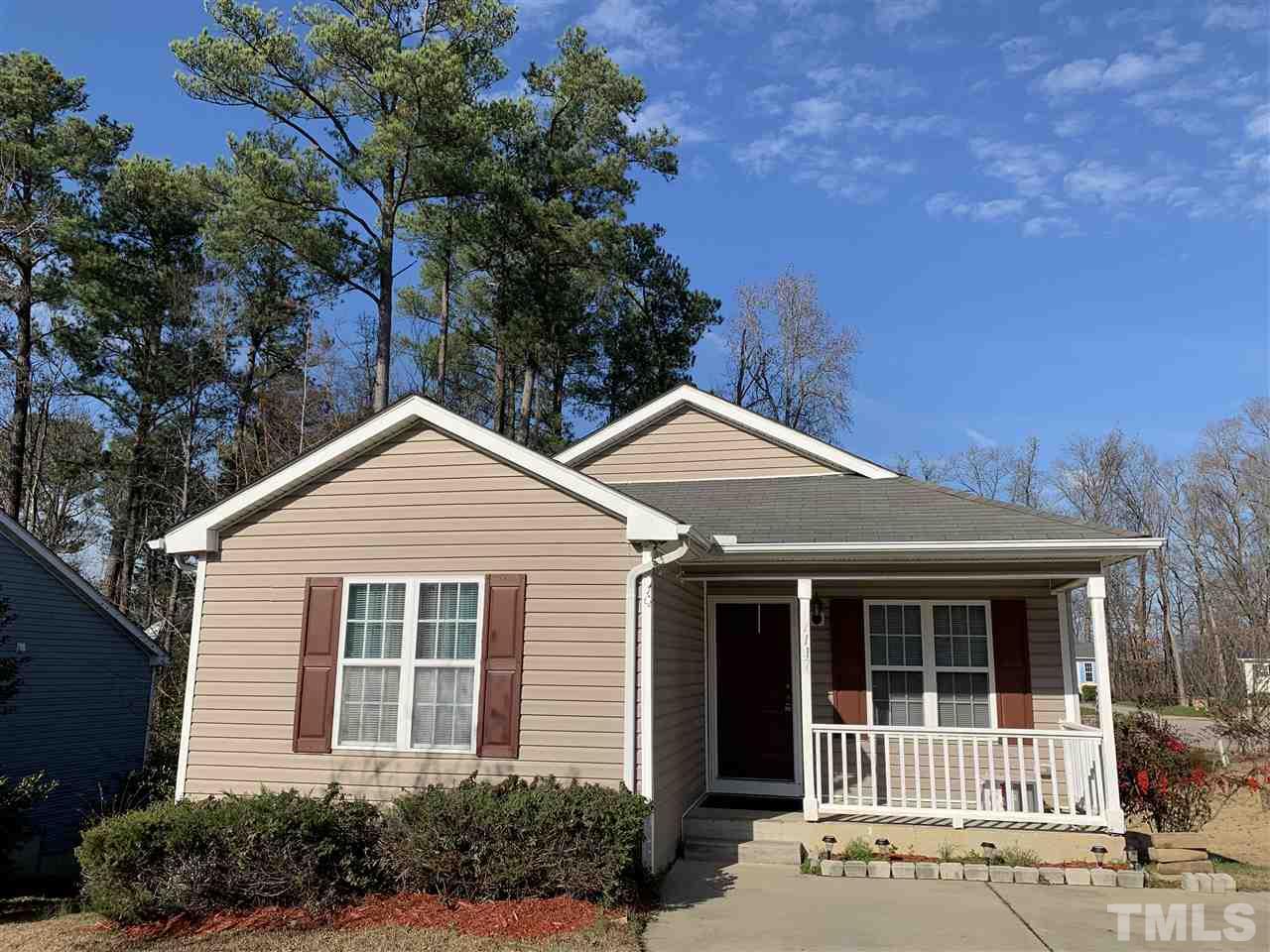 1117 Thelonious Drive Raleigh, NC 27610 - Photo 2 of 25 front view of a house with a yard