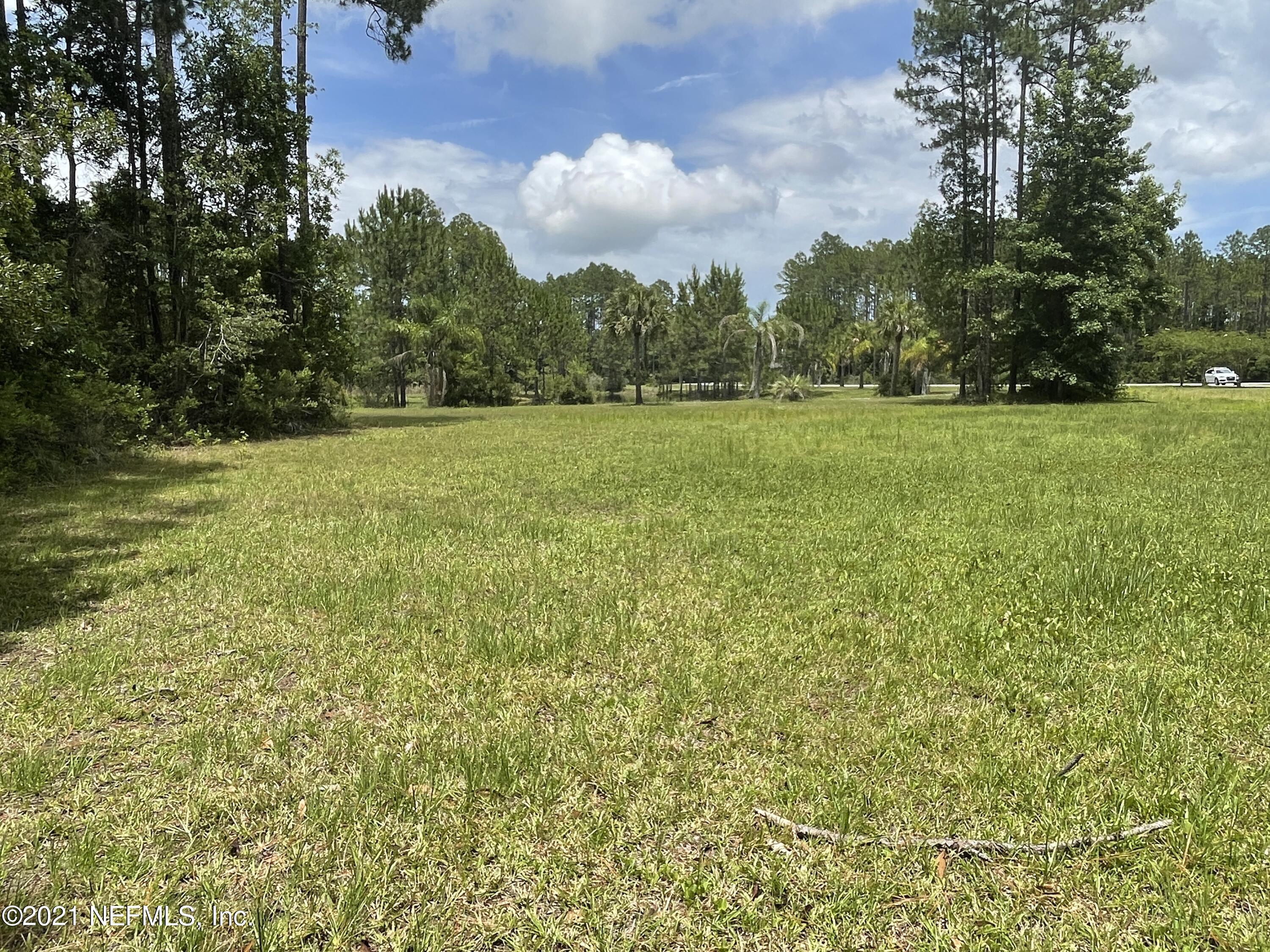 127 Foxcraft Street St. Augustine, FL 32092 - Photo 16 of 77 a view of a golf course with green space