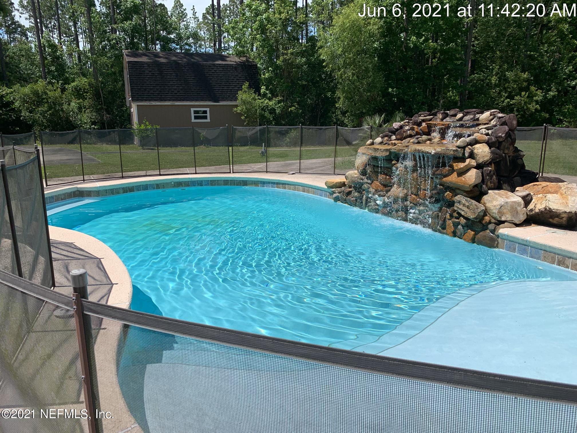 127 Foxcraft Street St. Augustine, FL 32092 - Photo 2 of 77 Pool with beach and fountain