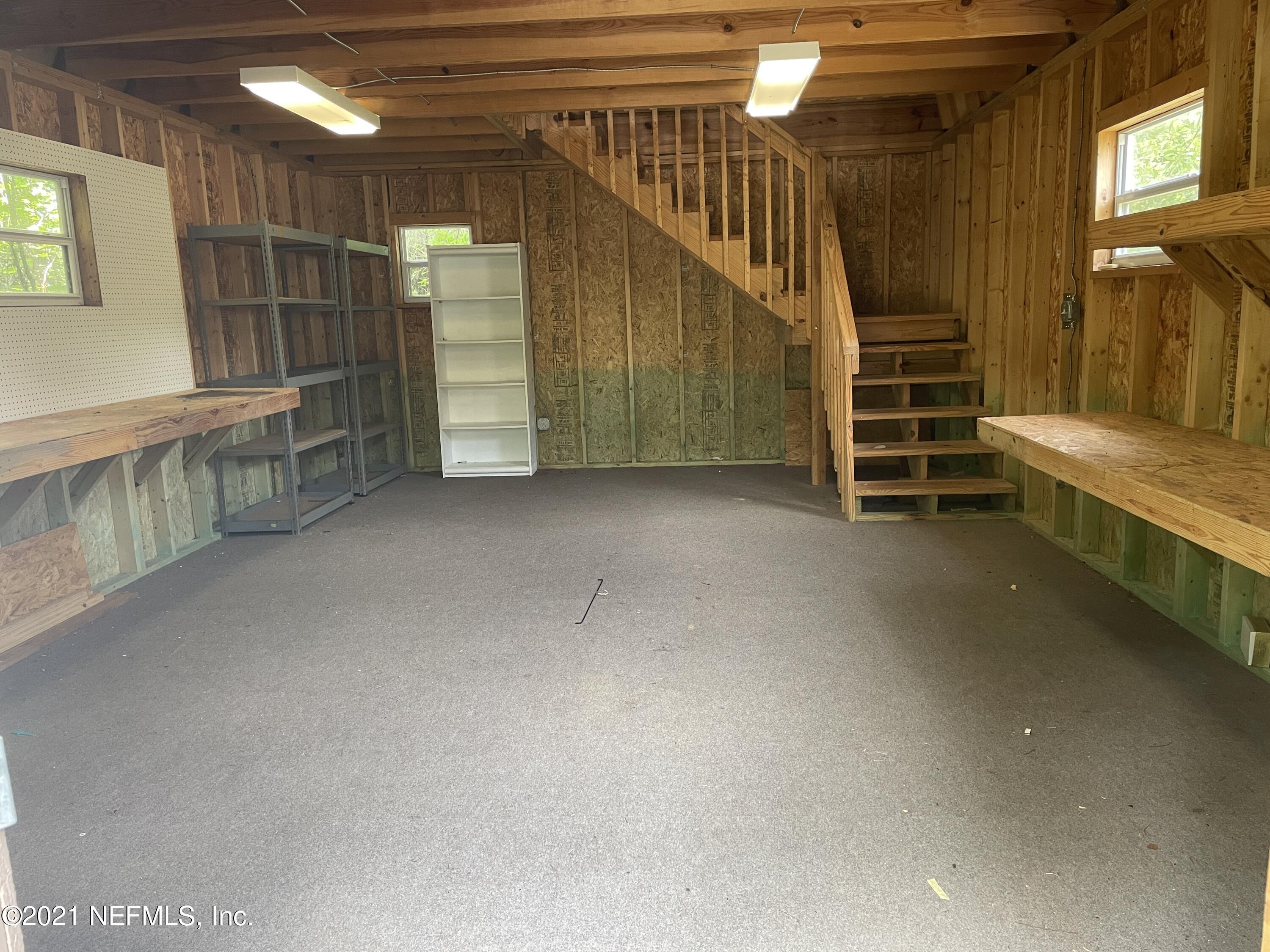 127 Foxcraft Street St. Augustine, FL 32092 - Photo 21 of 77 a view of an empty room with stairs and furniture