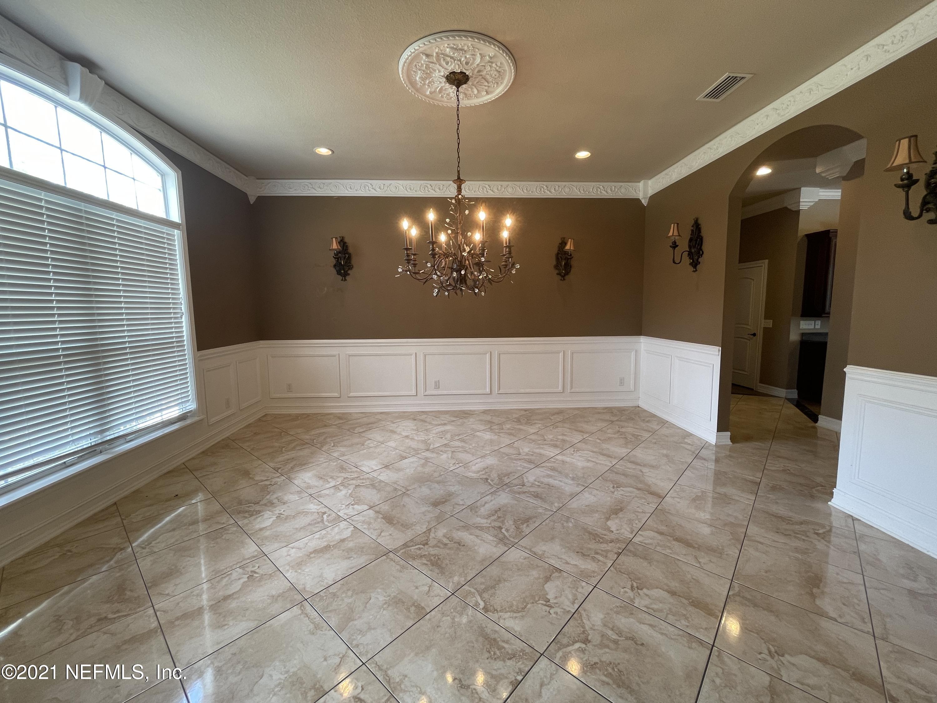 127 Foxcraft Street St. Augustine, FL 32092 - Photo 28 of 77 a view of a livingroom with a chandelier furniture and a chandelier