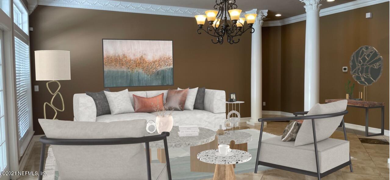127 Foxcraft Street St. Augustine, FL 32092 - Photo 33 of 77 a living room with furniture and a chandelier