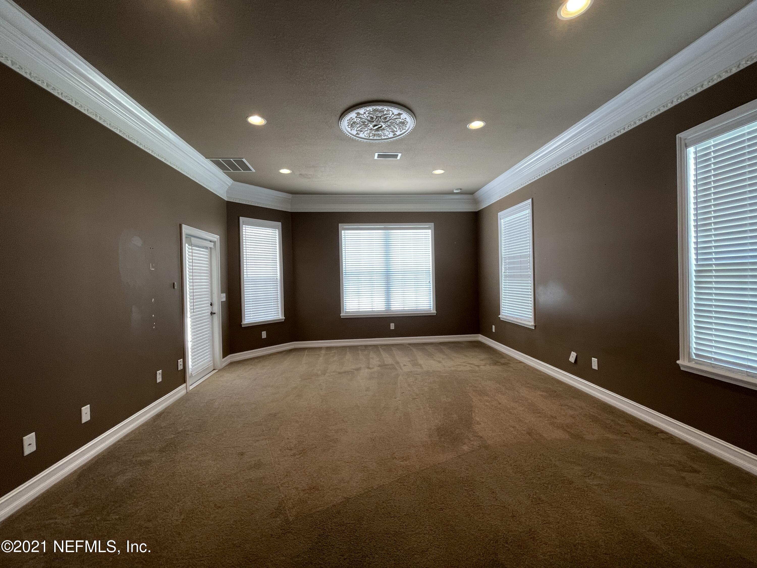 127 Foxcraft Street St. Augustine, FL 32092 - Photo 36 of 77 a view of an empty room with a window