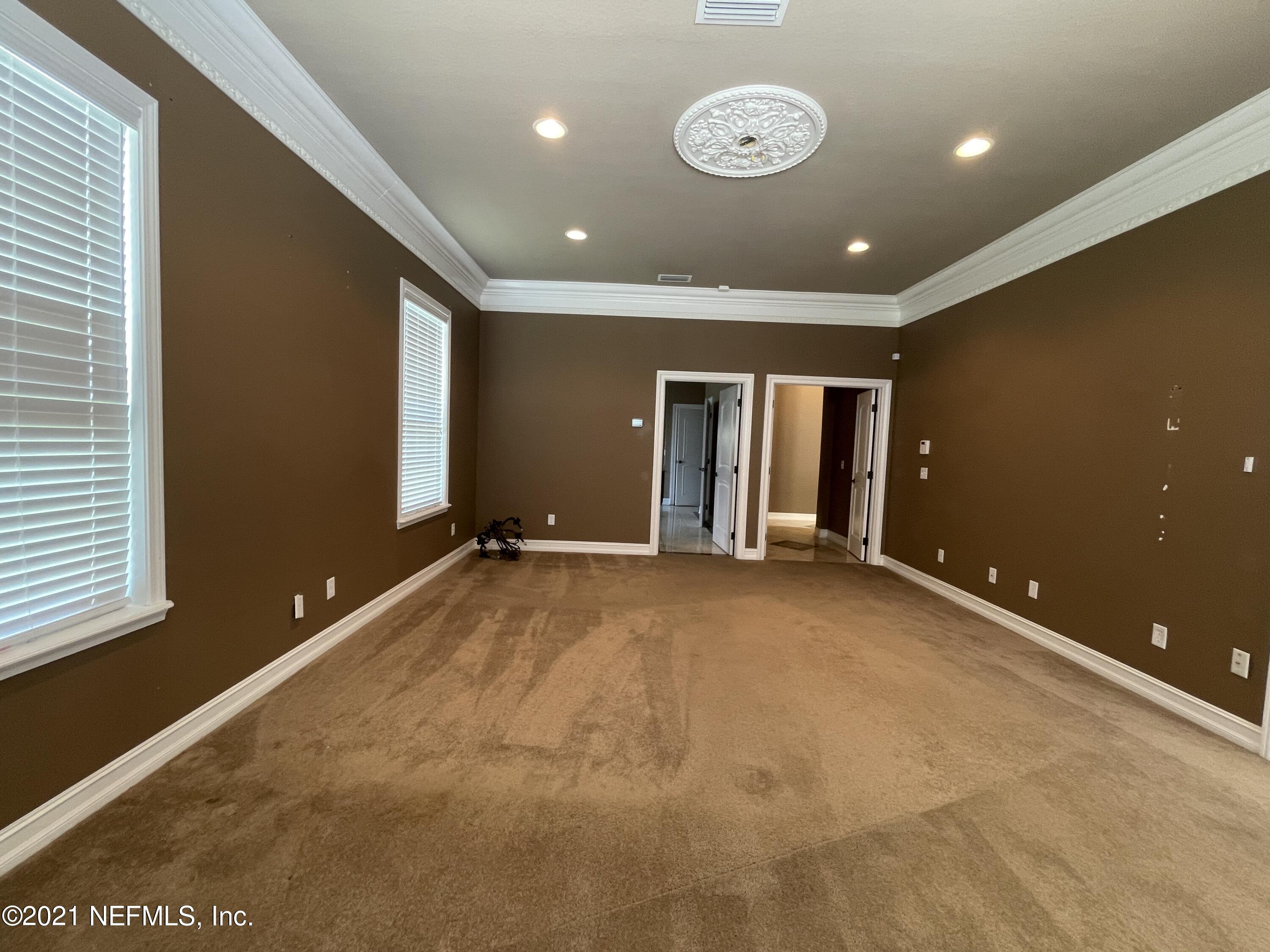 127 Foxcraft Street St. Augustine, FL 32092 - Photo 38 of 77 a view of an empty room with a window