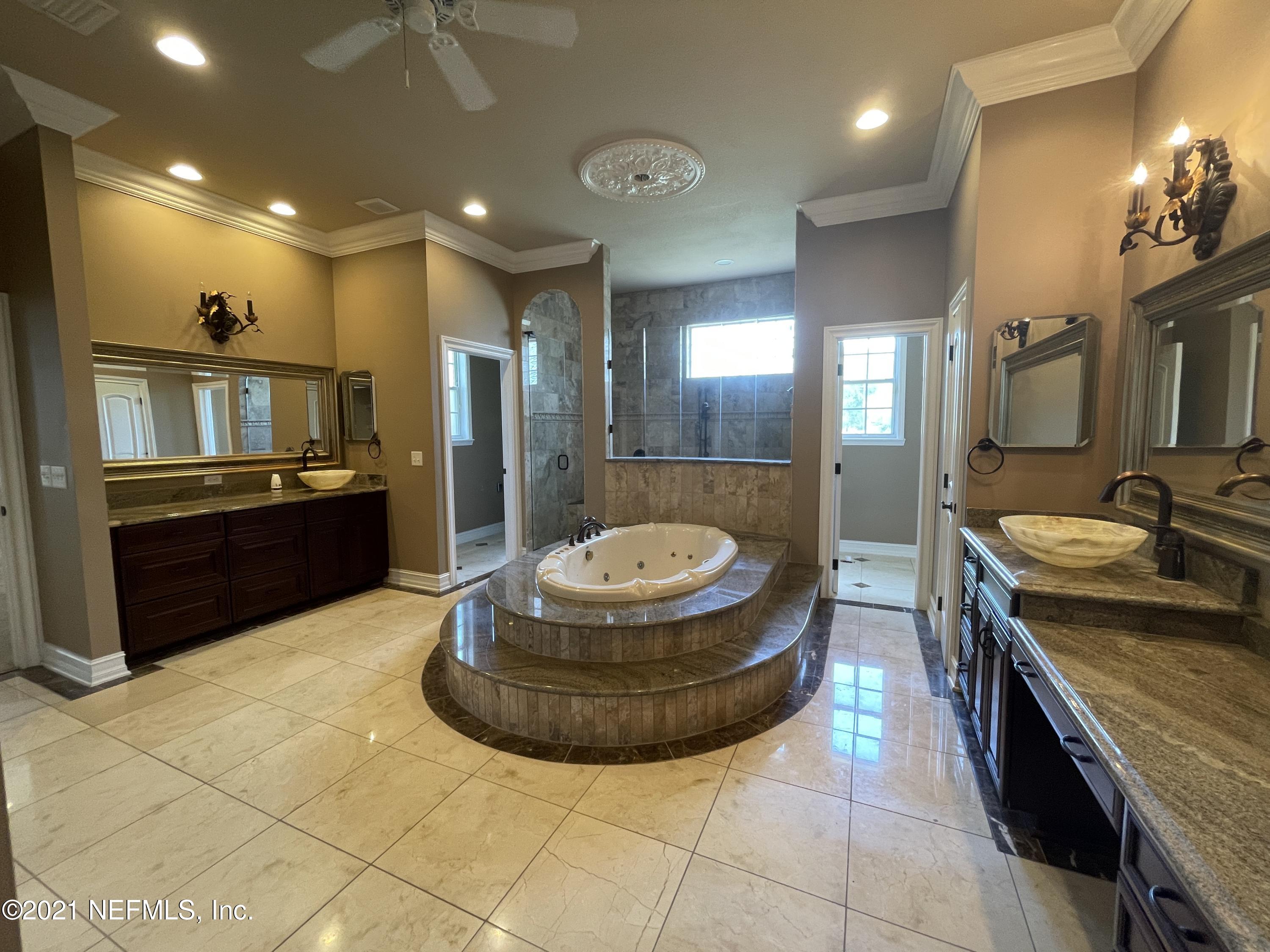 127 Foxcraft Street St. Augustine, FL 32092 - Photo 39 of 77 a view of a kitchen with granite countertop a sink and a stove