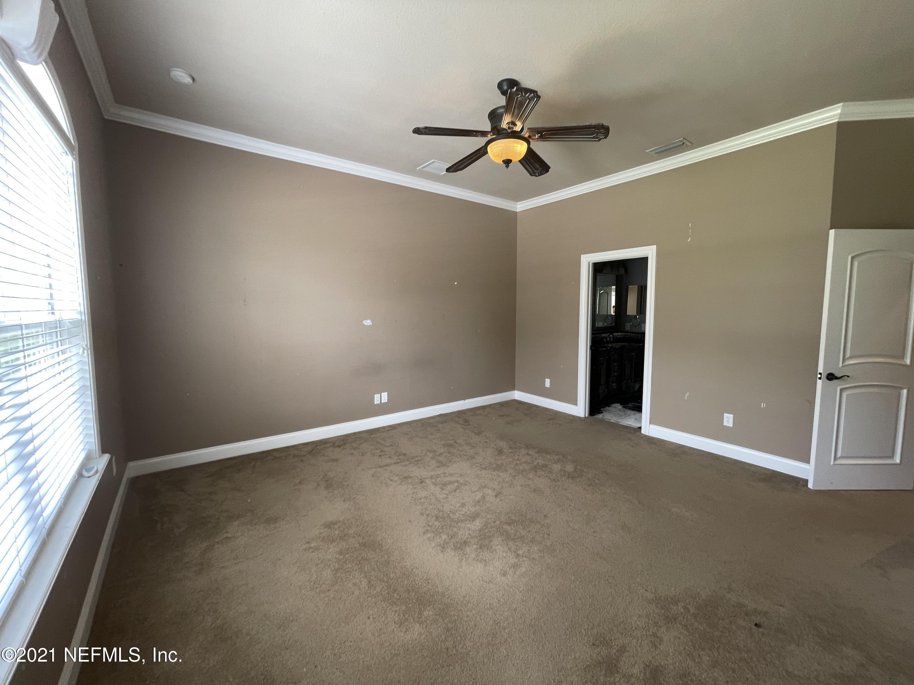 127 Foxcraft Street St. Augustine, FL 32092 - Photo 66 of 77 a view of an empty room and window