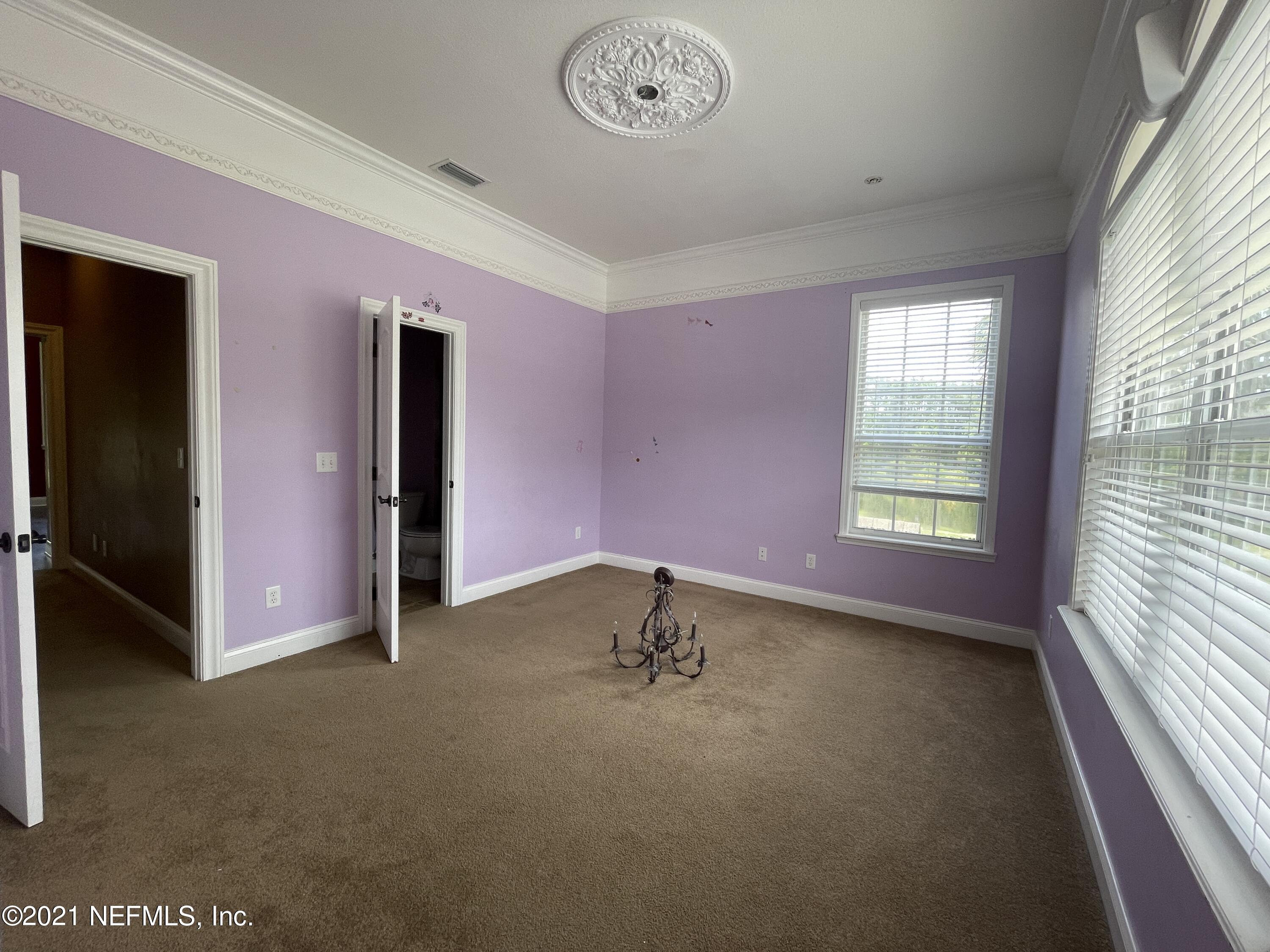 127 Foxcraft Street St. Augustine, FL 32092 - Photo 68 of 77 an empty room with a window