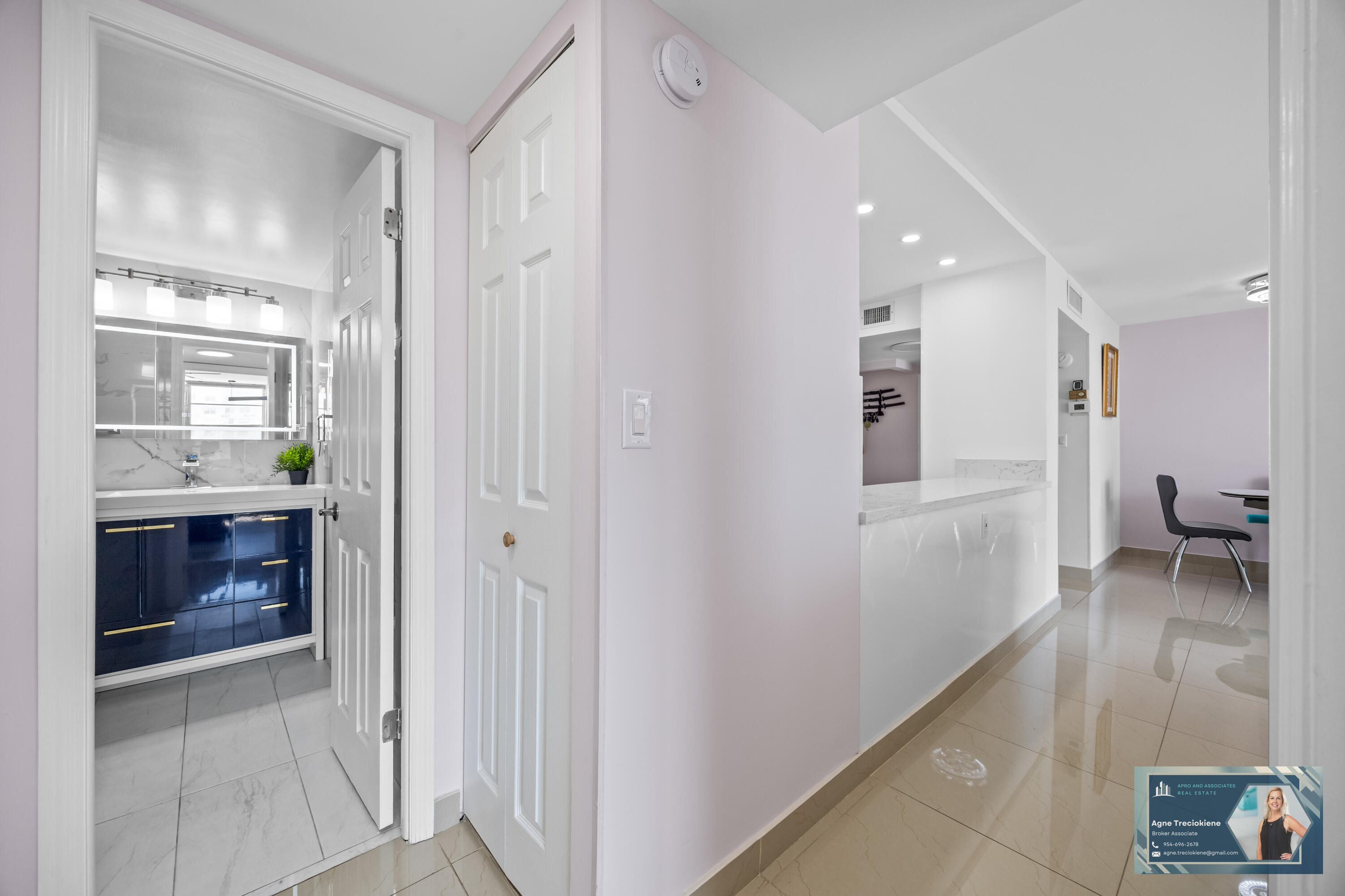2801 Northeast 183rd Street, Unit 1606W Aventura, FL 33160 - Photo 13 of 53 a bathroom with a sink and a mirror