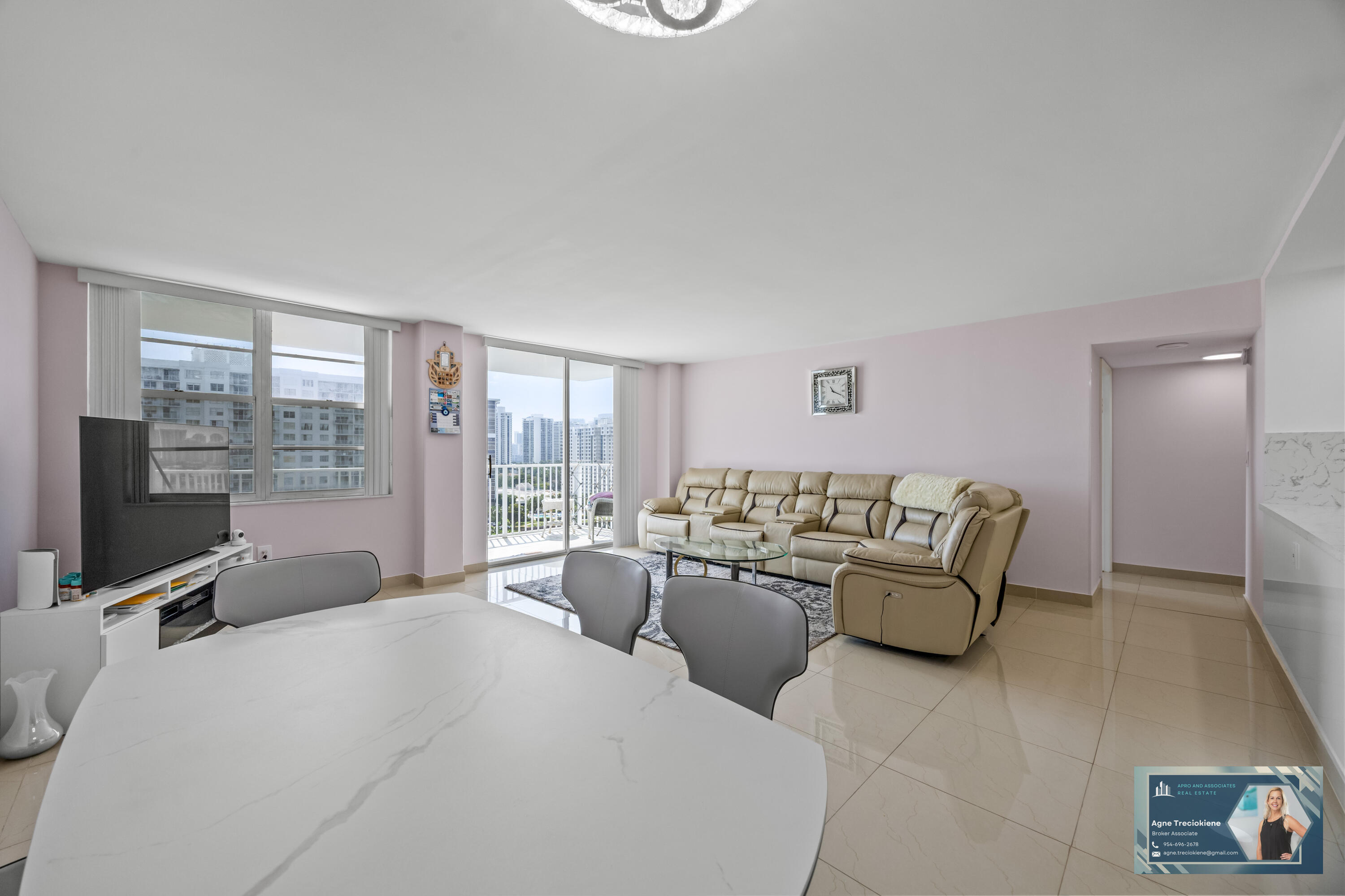 2801 Northeast 183rd Street, Unit 1606W Aventura, FL 33160 - Photo 14 of 53 a bed room with couch and a window