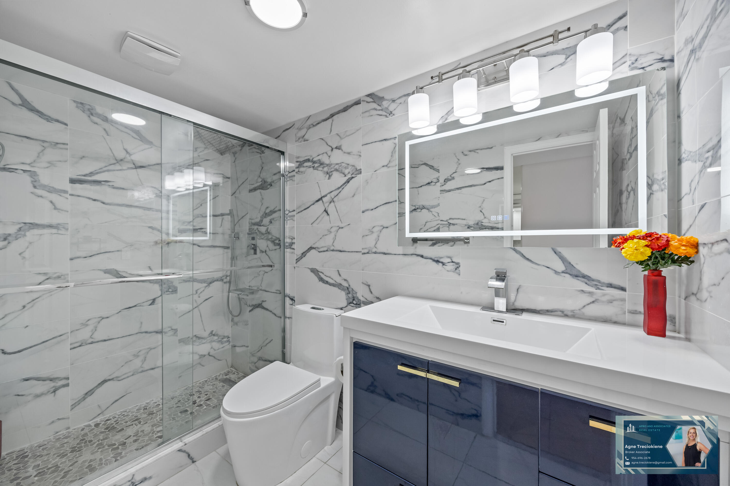 2801 Northeast 183rd Street, Unit 1606W Aventura, FL 33160 - Photo 22 of 53 a bathroom with a sink toilet and shower