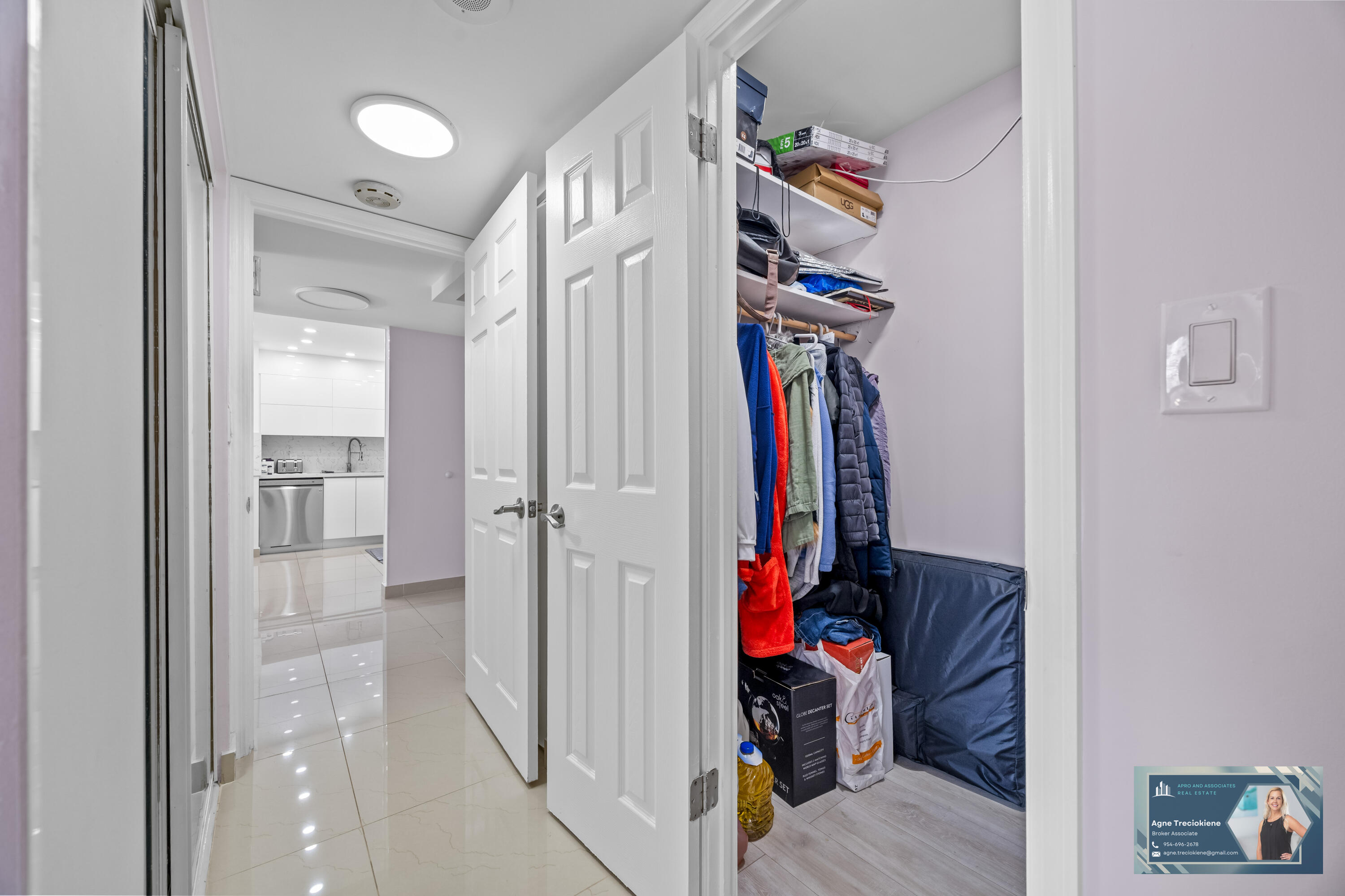 2801 Northeast 183rd Street, Unit 1606W Aventura, FL 33160 - Photo 24 of 53 a view of a room that has a bed and gym equipment