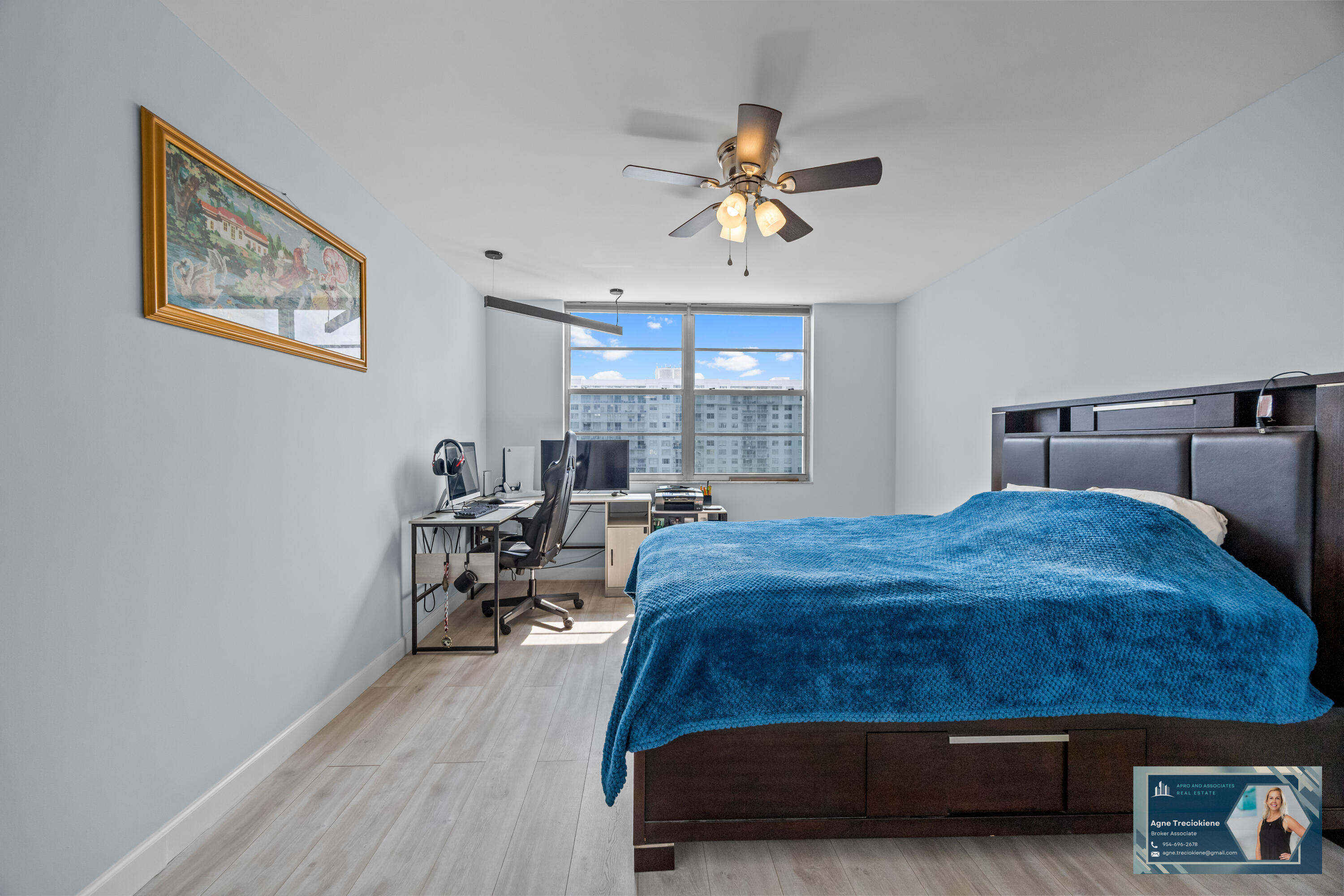 2801 Northeast 183rd Street, Unit 1606W Aventura, FL 33160 - Photo 25 of 53 a bedroom with a bed and a chandelier