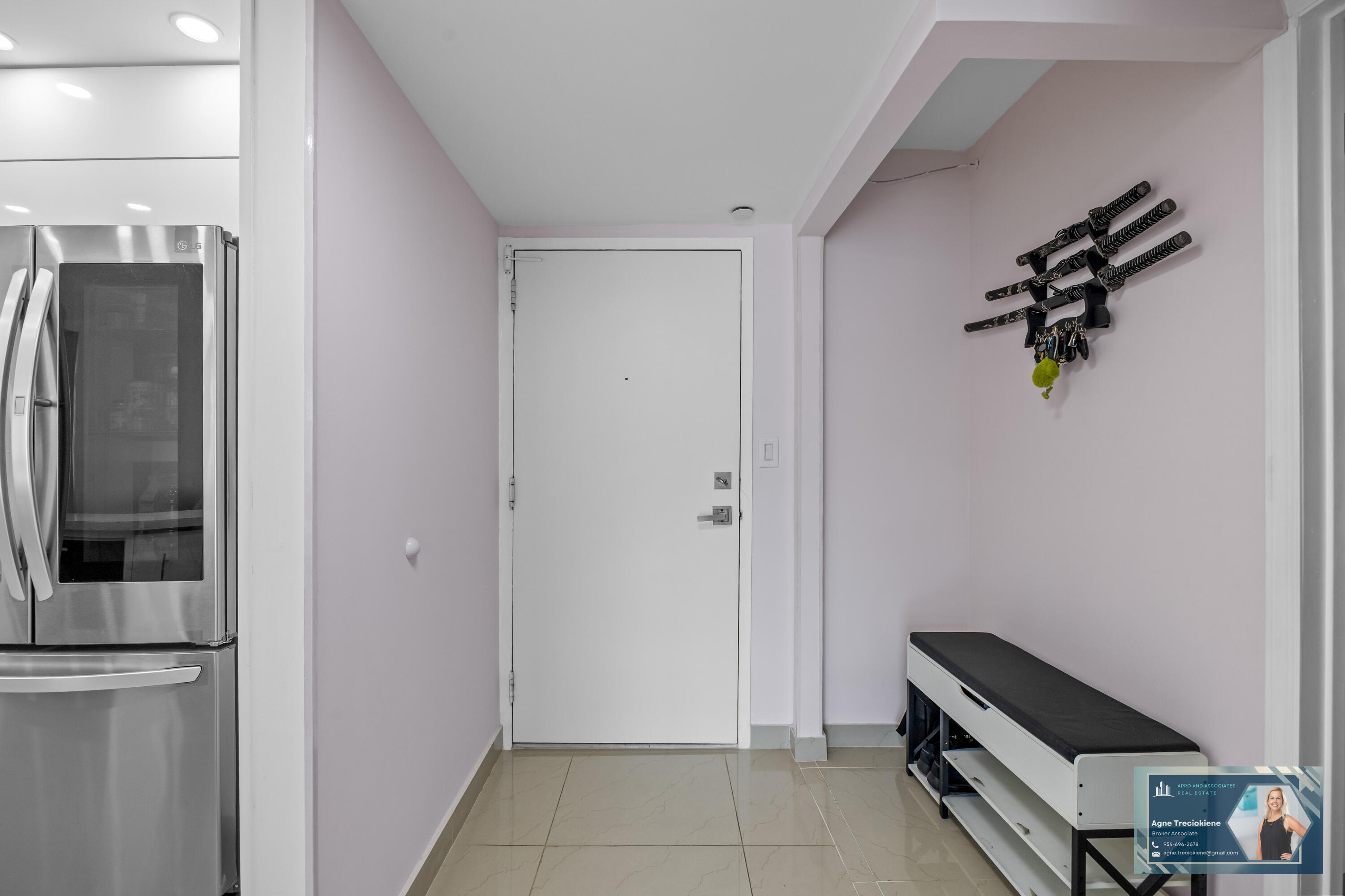 2801 Northeast 183rd Street, Unit 1606W Aventura, FL 33160 - Photo 30 of 53 a room with a closet and wooden floor