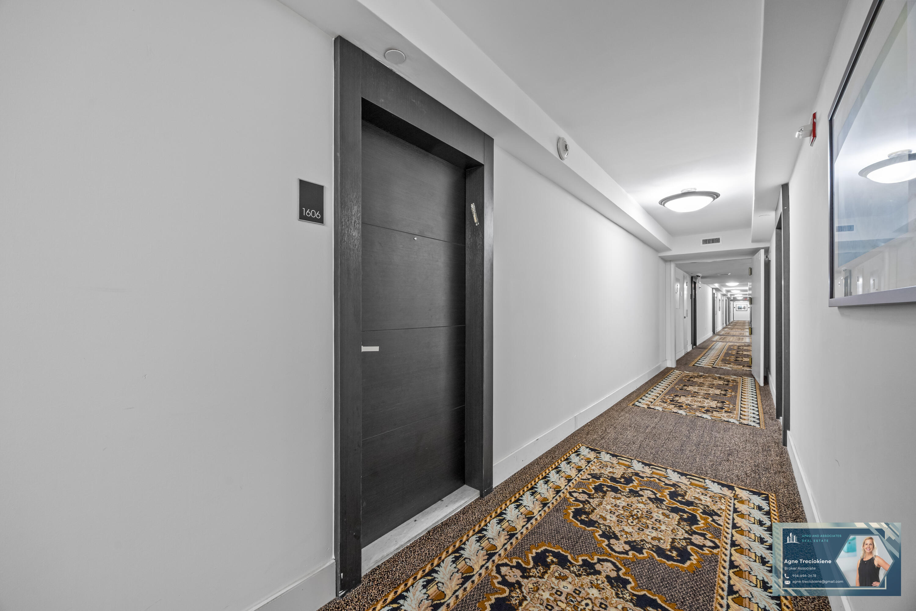 2801 Northeast 183rd Street, Unit 1606W Aventura, FL 33160 - Photo 32 of 53 a view of hallway with wooden floor