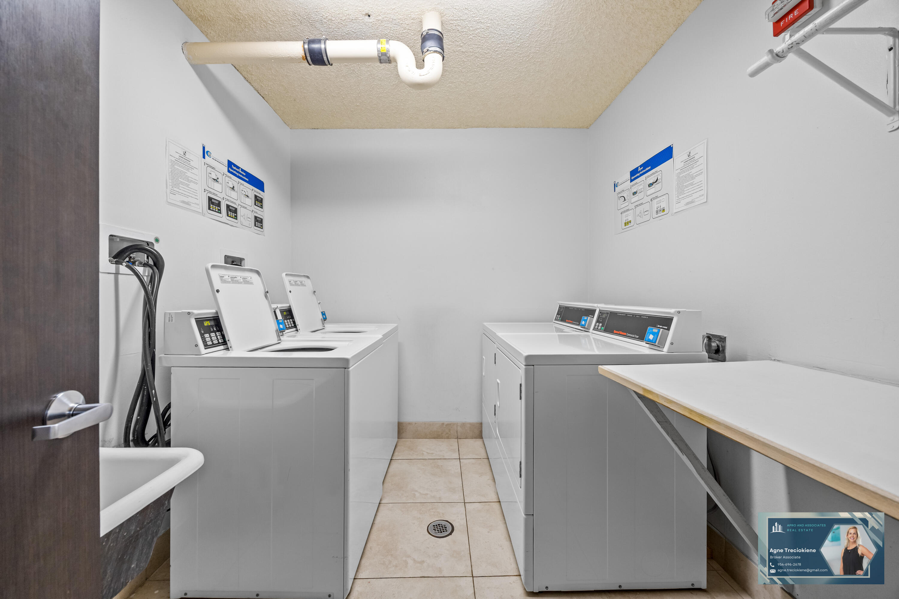 2801 Northeast 183rd Street, Unit 1606W Aventura, FL 33160 - Photo 35 of 53 a utility room with dryer and washer