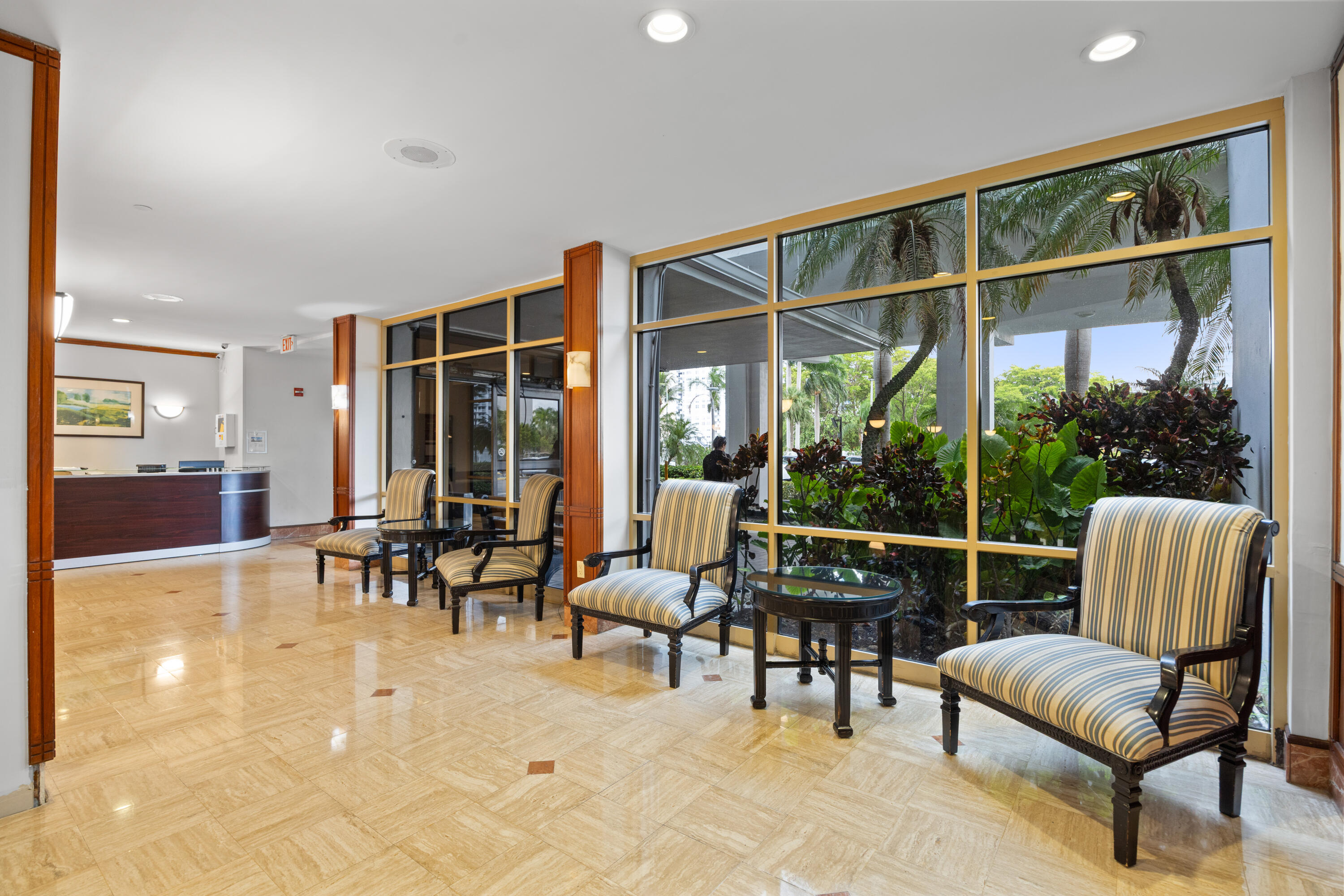 2801 Northeast 183rd Street, Unit 1606W Aventura, FL 33160 - Photo 40 of 53 a dining room with furniture and large windows