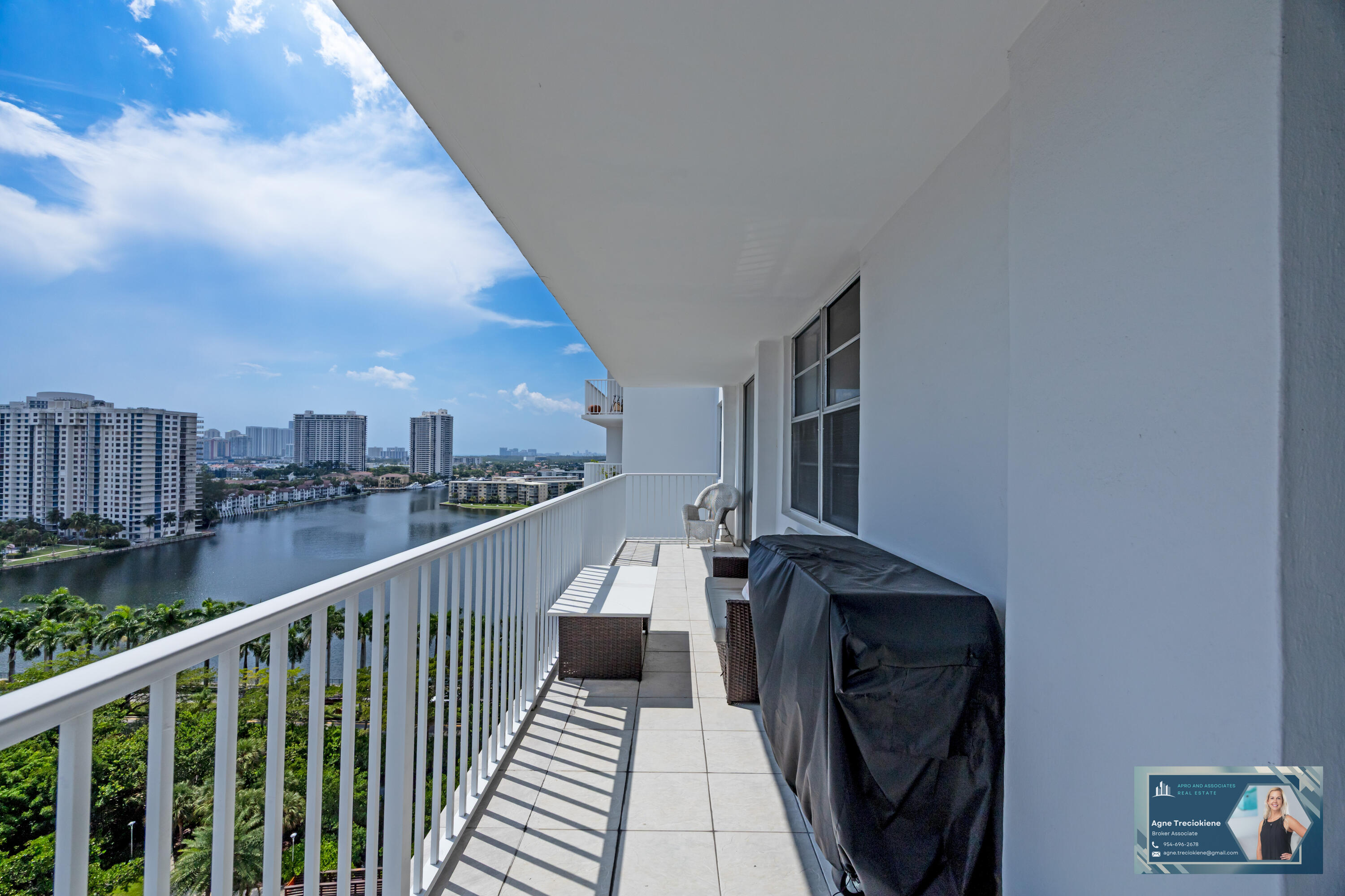 2801 Northeast 183rd Street, Unit 1606W Aventura, FL 33160 - Photo 6 of 53 a view of balcony with wooden floor and fence
