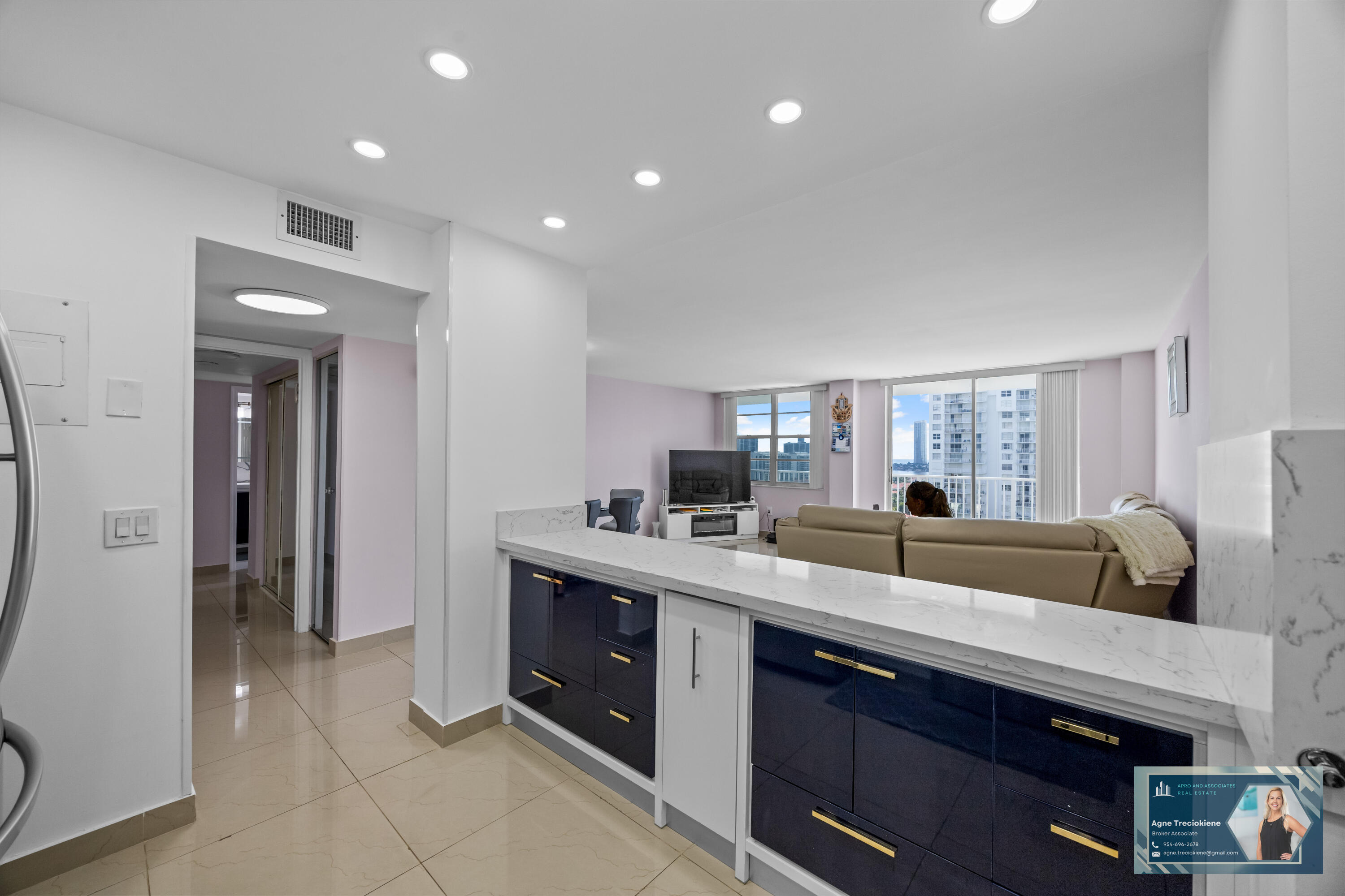 2801 Northeast 183rd Street, Unit 1606W Aventura, FL 33160 - Photo 9 of 53 a kitchen with a sink appliances and cabinets