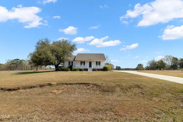 a view of a lake and a yard