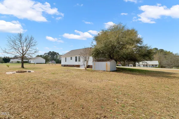 a house with trees in front of it